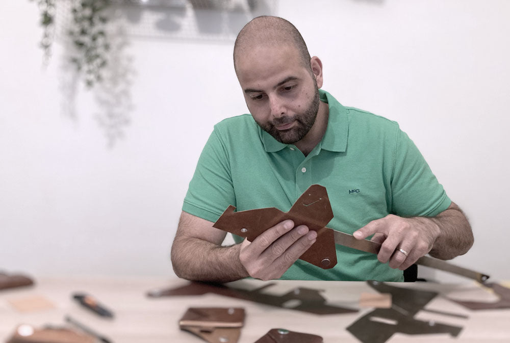 working-on-an-origami-leather-card-holder