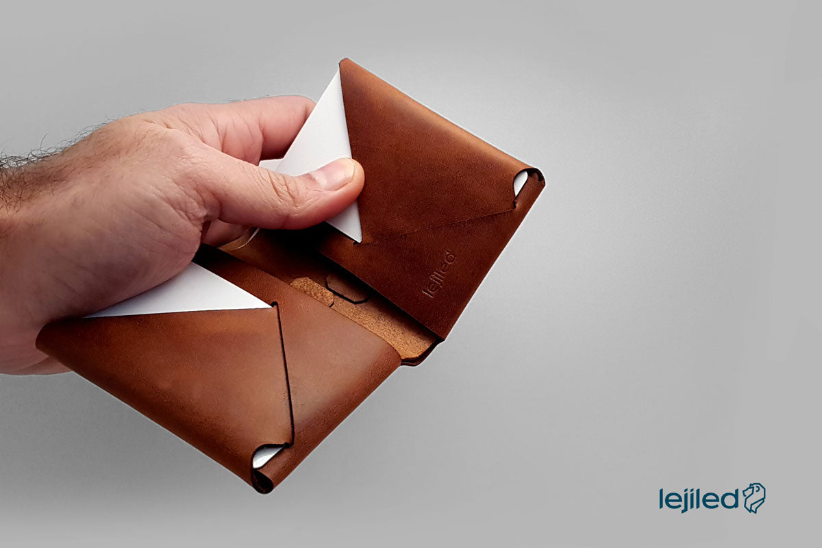 Origami-leather-bifold-wallet_certified-vegetable-tanned-leather-opened-with-card